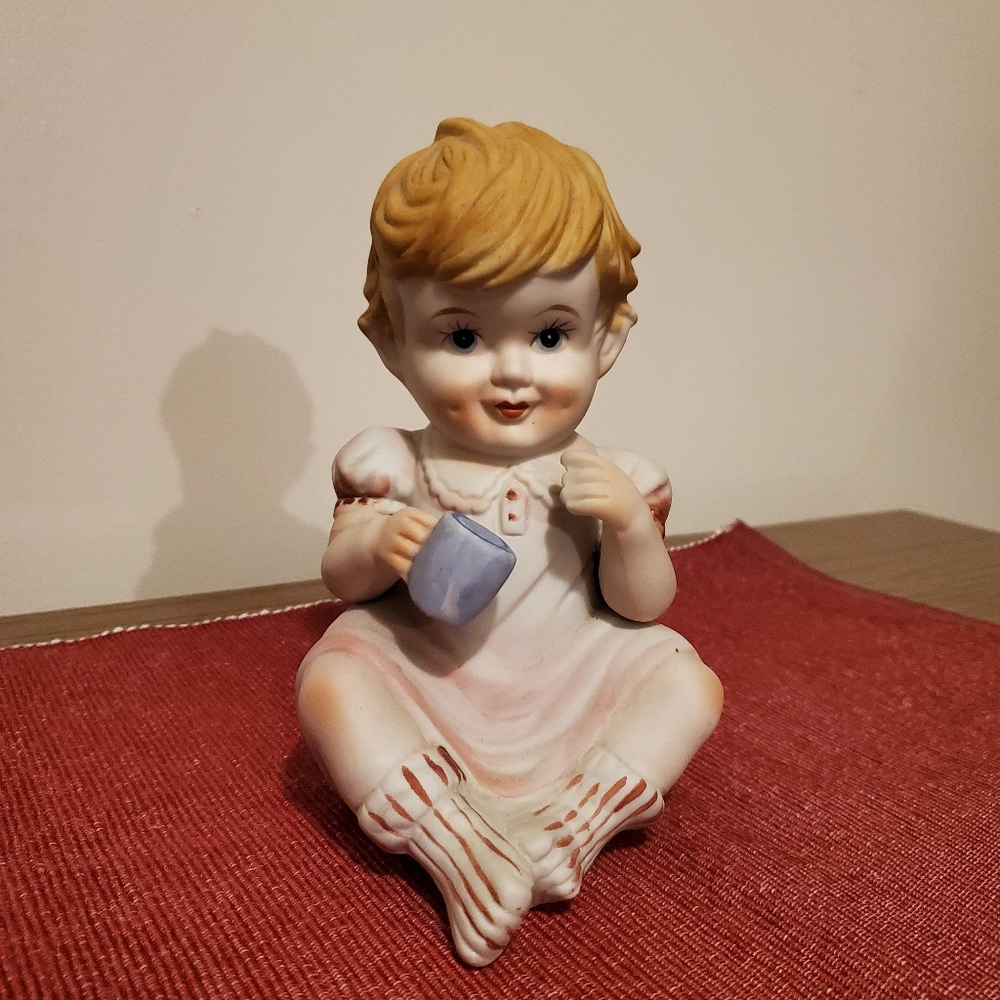 Vintage Bisque Porcelain Piano Baby Figurine With Cup